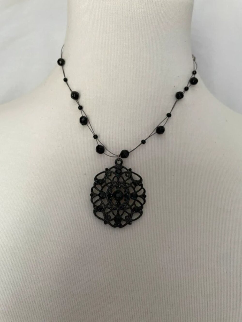 black pendant beaded necklace